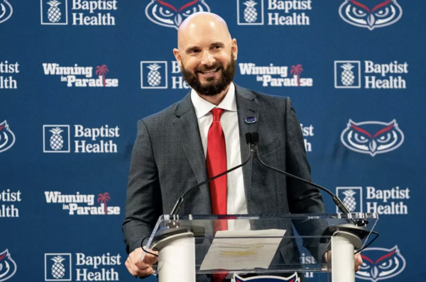 Men's basketball head coach John Jakus speaking at his introduction ceremony to the Boca community and students on March 29. 